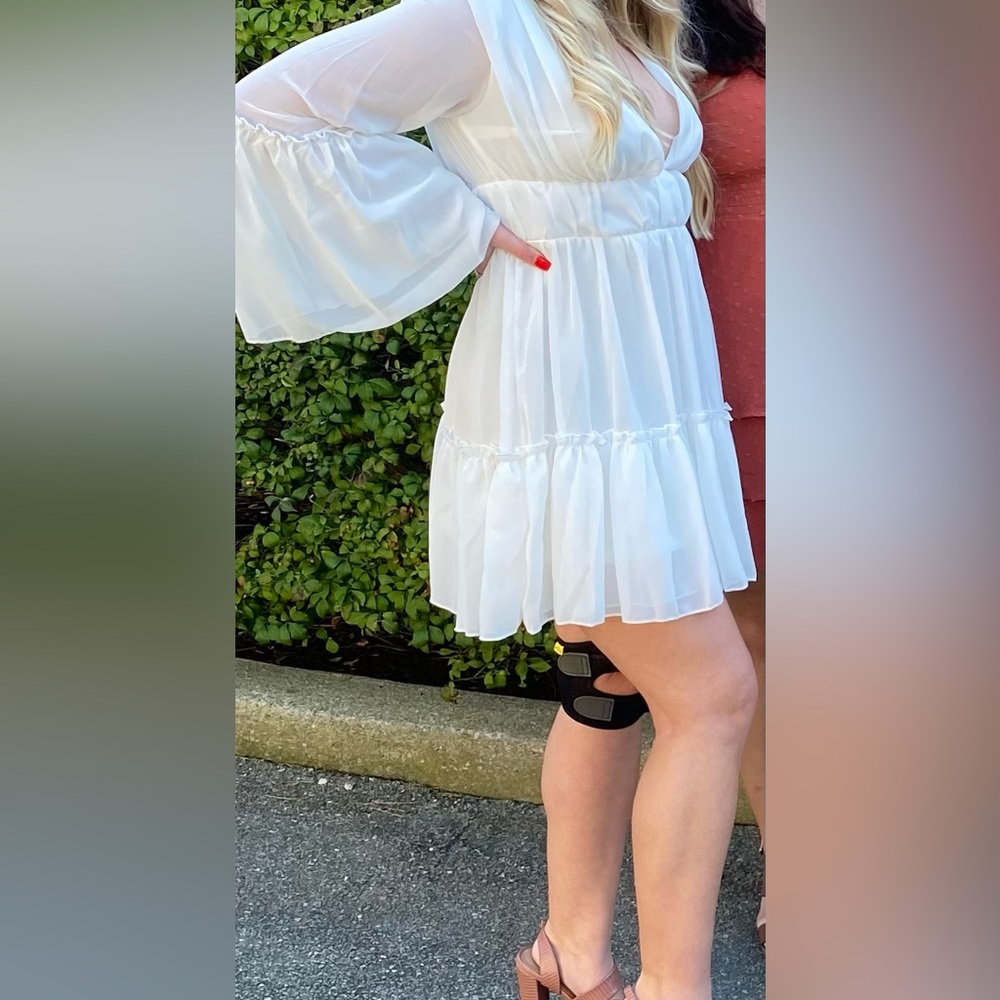 Hi! Selling this cute White Bell Sleeve Dress
